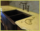 Concrete countertop with custom embeds