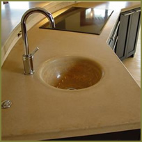 Concrete Farmhouse Sink Is a Natural Fit with Seamless Concrete Kitchen Countertops